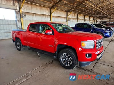 Czwarte zdjęcie samochodu z boku: 2015 GMC CANYON SLE VIN:1GTG6BE30F1227915 - miniatura
