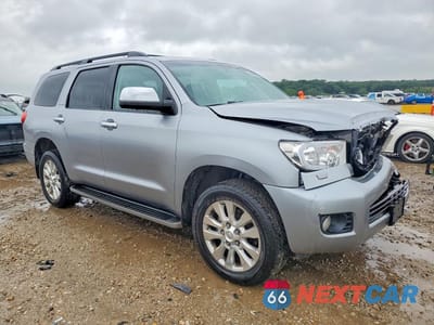 Czwarte zdjęcie samochodu z boku: 2011 TOYOTA SEQUOIA PLATINUM VIN:5TDDW5G16BS054690 - miniatura
