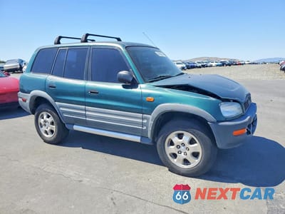 Czwarte zdjęcie samochodu z boku: 1997 TOYOTA RAV4 BASE VIN:JT3HP10V9V7020637 - miniatura