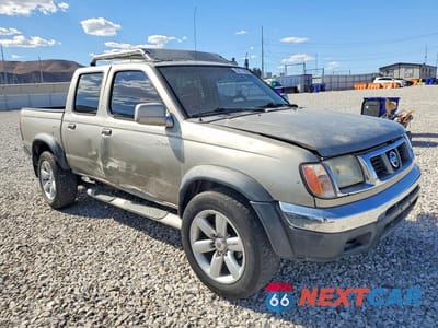 Czwarte zdjęcie samochodu z boku: 2000 NISSAN FRONTIER 4WD SE CREW VIN:1N6ED27T6YC423372 - miniatura