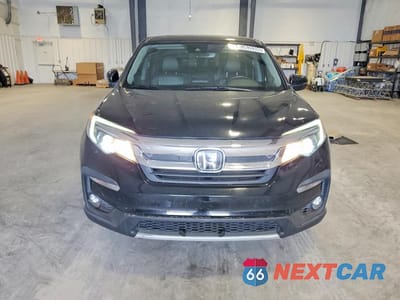 Piąte zdjęcie samochodu w środku: 2021 HONDA PILOT EXL VIN:5FNYF5H54MB009628 - miniatura