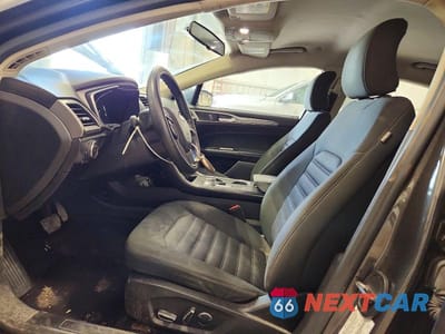 Zdjęcie 7 z 12 samochodu: 2017 FORD FUSION SE HYBRID VIN:3FA6P0LU4HR250671 - miniatura