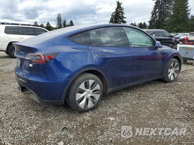 Trzecie zdjęcie samochodu z tyłu: 2023 TESLA MODEL Y VIN:7SAYGDEE8PA113393 - miniatura