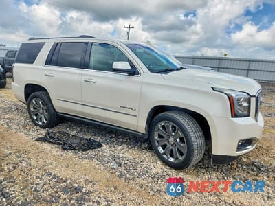 Czwarte zdjęcie samochodu z boku: 2015 GMC YUKON DENALI VIN:1GKS2CKJ6FR728182 - miniatura