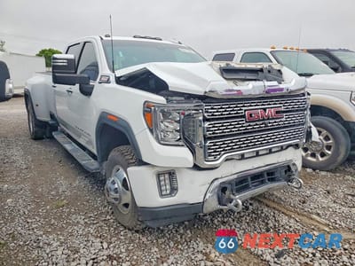 Czwarte zdjęcie samochodu z boku: 2020 GMC SIERRA K3500 DENALI VIN:1GT49WEY0LF270520 - miniatura