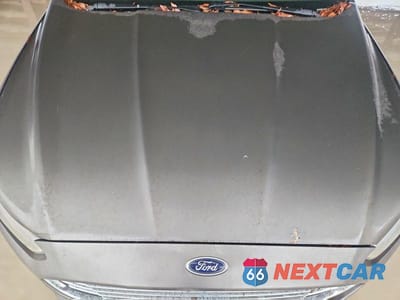 Zdjęcie 11 z 12 samochodu: 2014 FORD FUSION TITANIUM VIN:3FA6P0D9XER290629 - miniatura