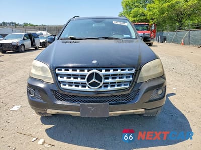 Piąte zdjęcie samochodu w środku: 2011 MERCEDES-BENZ ML 350 VIN:4JGBB5GBXBA634304 - miniatura