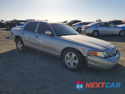 Czwarte zdjęcie samochodu z boku: 2011 FORD CROWN VICTORIA LX VIN:2FABP7EV8BX127154 - miniatura