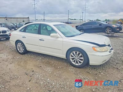 Czwarte zdjęcie samochodu z boku: 2006 HYUNDAI AZERA VIN:KMHFC46F96A063522 - miniatura