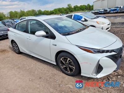 Czwarte zdjęcie samochodu z boku: 2022 TOYOTA PRIUS PRIME XLE VIN:JTDKAMFP5N3203067 - miniatura