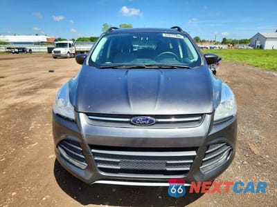 Piąte zdjęcie samochodu w środku: 2016 FORD ESCAPE SE VIN:1FMCU9GXXGUC07499 - miniatura
