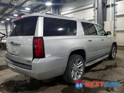 Trzecie zdjęcie samochodu z tyłu: 2016 CHEVROLET SUBURBAN K1500 LTZ VIN:1GNSKJKC9GR117492 - miniatura