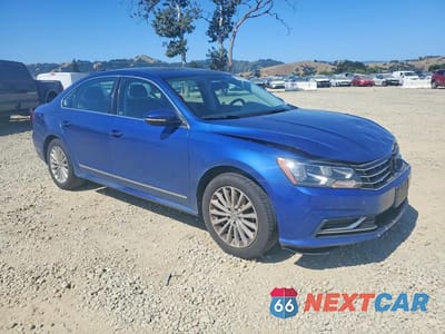 Czwarte zdjęcie samochodu z boku: 2016 VOLKSWAGEN PASSAT SE VIN:1VWBT7A39GC061726 - miniatura
