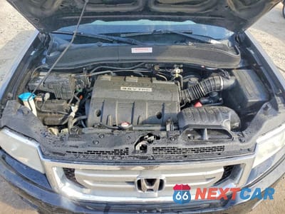 Zdjęcie 11 z 12 samochodu: 2010 HONDA RIDGELINE RTL VIN:5FPYK1F52AB011694 - miniatura