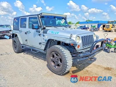 Czwarte zdjęcie samochodu z boku: 2011 JEEP WRANGLER UNLIMITED SPORT VIN:1J4BA3H17BL582713 - miniatura