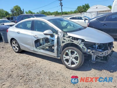 Czwarte zdjęcie samochodu z boku: 2017 CHEVROLET CRUZE PREMIER VIN:1G1BF5SM8H7105692 - miniatura