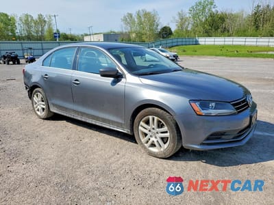 Czwarte zdjęcie samochodu z boku: 2017 VOLKSWAGEN JETTA S VIN:3VW2B7AJ2HM266774 - miniatura