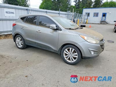 Czwarte zdjęcie samochodu z boku: 2013 HYUNDAI TUCSON LIMITED VIN:KM8JU3AC9DU665279 - miniatura