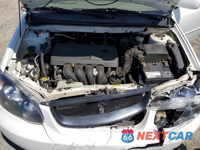 Zdjęcie 11 z 12 samochodu: 2004 TOYOTA COROLLA LE VIN:JTDBR32E042024933 - miniatura
