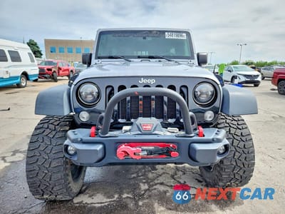Piąte zdjęcie samochodu w środku: 2015 JEEP WRANGLER UNLIMITED RUBICON VIN:1C4BJWFG6FL721895 - miniatura