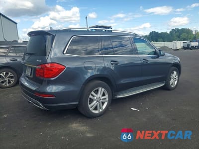 Trzecie zdjęcie samochodu z tyłu: 2014 MERCEDES-BENZ GL 450 4MATIC VIN:4JGDF7CE2EA283966 - miniatura