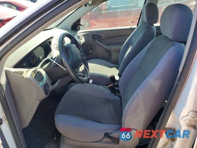 Zdjęcie 7 z 12 samochodu: 2004 FORD FOCUS LX VIN:1FAFP33Z24W138827 - miniatura