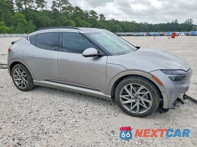 Czwarte zdjęcie samochodu z boku: 2024 GENESIS GV60 ADVANCED VIN:KMUKCDSC6RU020514 - miniatura