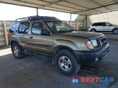 Czwarte zdjęcie samochodu z boku: 2001 NISSAN XTERRA XE-V6 VIN:5N1ED28T41C589876 - miniatura