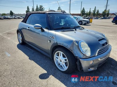 Czwarte zdjęcie samochodu z boku: 2006 MINI COOPER S VIN:WMWRH33536TK57022 - miniatura