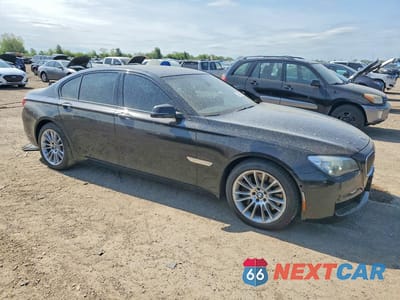 Czwarte zdjęcie samochodu z boku: 2013 BMW 750 XI VIN:WBAYB6C59DD224032 - miniatura