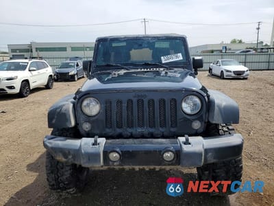 Piąte zdjęcie samochodu w środku: 2016 JEEP WRANGLER UNLIMITED SPORT VIN:1C4BJWDGXGL204748 - miniatura
