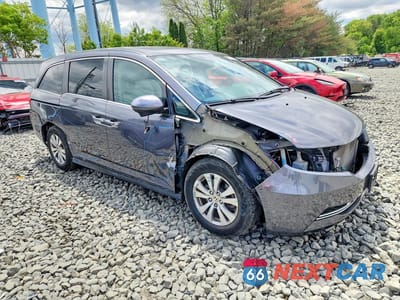 Czwarte zdjęcie samochodu z boku: 2017 HONDA ODYSSEY EXL VIN:5FNRL5H62HB014676 - miniatura