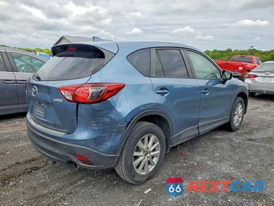 Trzecie zdjęcie samochodu z tyłu: 2016 MAZDA CX-5 TOURING VIN:JM3KE4CY8G0895807 - miniatura