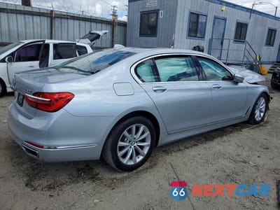 Trzecie zdjęcie samochodu z tyłu: 2018 BMW 750 I VIN:WBA7F0C50JGM23722 - miniatura