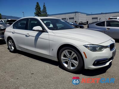 Czwarte zdjęcie samochodu z boku: 2017 BMW 330E VIN:WBA8E1C59HK895308 - miniatura