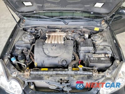Zdjęcie 11 z 13 samochodu: 2003 HYUNDAI SONATA GL VIN:KMHWF25H33A856227 - miniatura