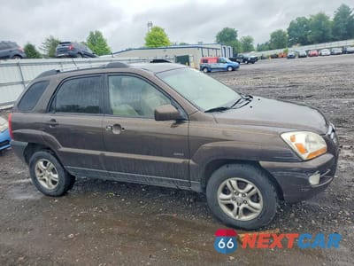 Czwarte zdjęcie samochodu z boku: 2006 KIA SPORTAGE LX VIN:KNDJE723767152007 - miniatura