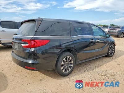 Trzecie zdjęcie samochodu z tyłu: 2023 HONDA ODYSSEY EXL VIN:5FNRL6H67PB042736 - miniatura