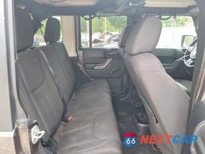 Zdjęcie 10 z 12 samochodu: 2014 JEEP WRANGLER UNLIMITED SPORT VIN:1C4BJWDGXEL267801 - miniatura