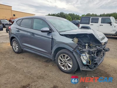 Czwarte zdjęcie samochodu z boku: 2016 HYUNDAI TUCSON SE VIN:KM8J23A4XGU239104 - miniatura