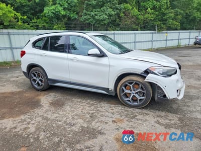Czwarte zdjęcie samochodu z boku: 2017 BMW X1 SDRIVE28I VIN:WBXHU7C31H5H37833 - miniatura
