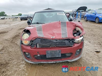 Piąte zdjęcie samochodu w środku: 2009 MINI COOPER VIN:WMWMF335X9TW72889 - miniatura