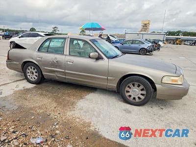Czwarte zdjęcie samochodu z boku: 2006 MERCURY GRAND MARQUIS LS VIN:2MEHM75V66X649914 - miniatura