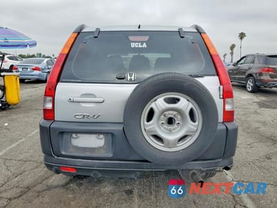 Zdjęcie 6 z 14 samochodu: 2003 HONDA CR-V LX VIN:JHLRD78413C019481 - miniatura