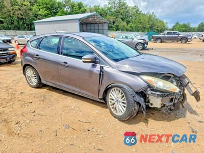 Czwarte zdjęcie samochodu z boku: 2012 FORD FOCUS SEL VIN:1FAHP3M20CL410348 - miniatura