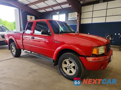Czwarte zdjęcie samochodu z boku: 2002 FORD RANGER VIN:1FTZR45E42TA14624 - miniatura