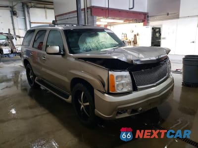 Czwarte zdjęcie samochodu z boku: 2002 CADILLAC ESCALADE VIN:1GYEK63NX2R115630 - miniatura