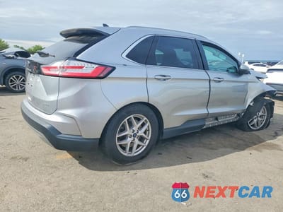 Trzecie zdjęcie samochodu z tyłu: 2022 FORD EDGE SEL VIN:2FMPK4J92NBB10420 - miniatura