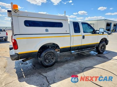 Trzecie zdjęcie samochodu z tyłu: 2014 FORD F-250 SD VIN:1FT7X2B61EEA23613 - miniatura