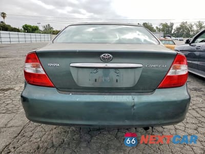 Zdjęcie 6 z 12 samochodu: 2002 TOYOTA CAMRY LE VIN:JTDBE32K420117173 - miniatura